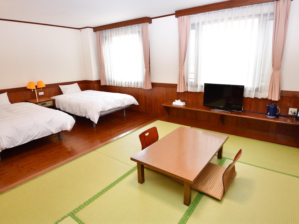 Semi Western Room Type A ( Twin beds + Japanese Tatami 6 mats )